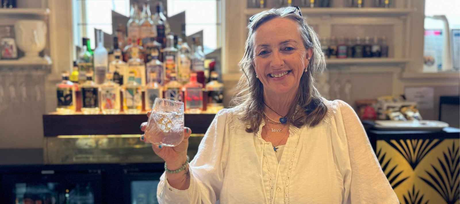 Ginny Behind the Bar of National Distillery Company's Cellar Door and Tasting Room